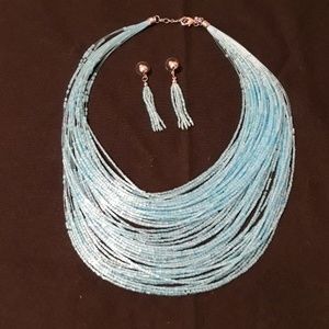 Blue shiny necklace and earring set.